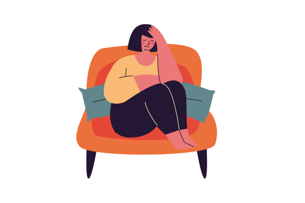 A cartoon of a person looking sad in an armchair.